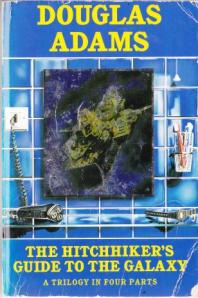 My beat-up (but personally signed) copy of The Hitchhiker's Guide